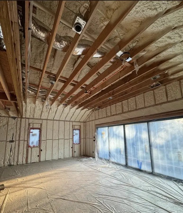 Interior walls and ceiling insulated with spray foam during new construction in Sherrelwood
